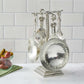 pewter vineyard measuring cups on counter post