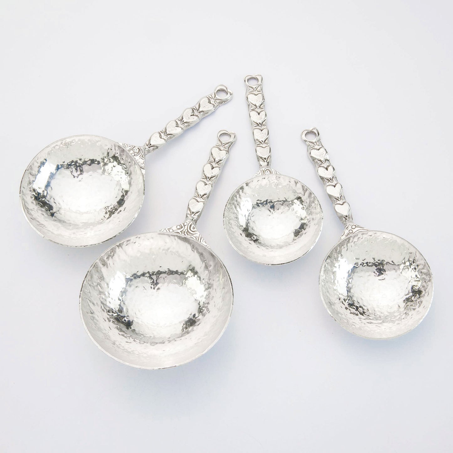 pewter heart measuring cups