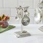 pewter vineyard measuring spoons on counter post