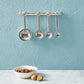 pewter farm to table measuring spoons on wall strip