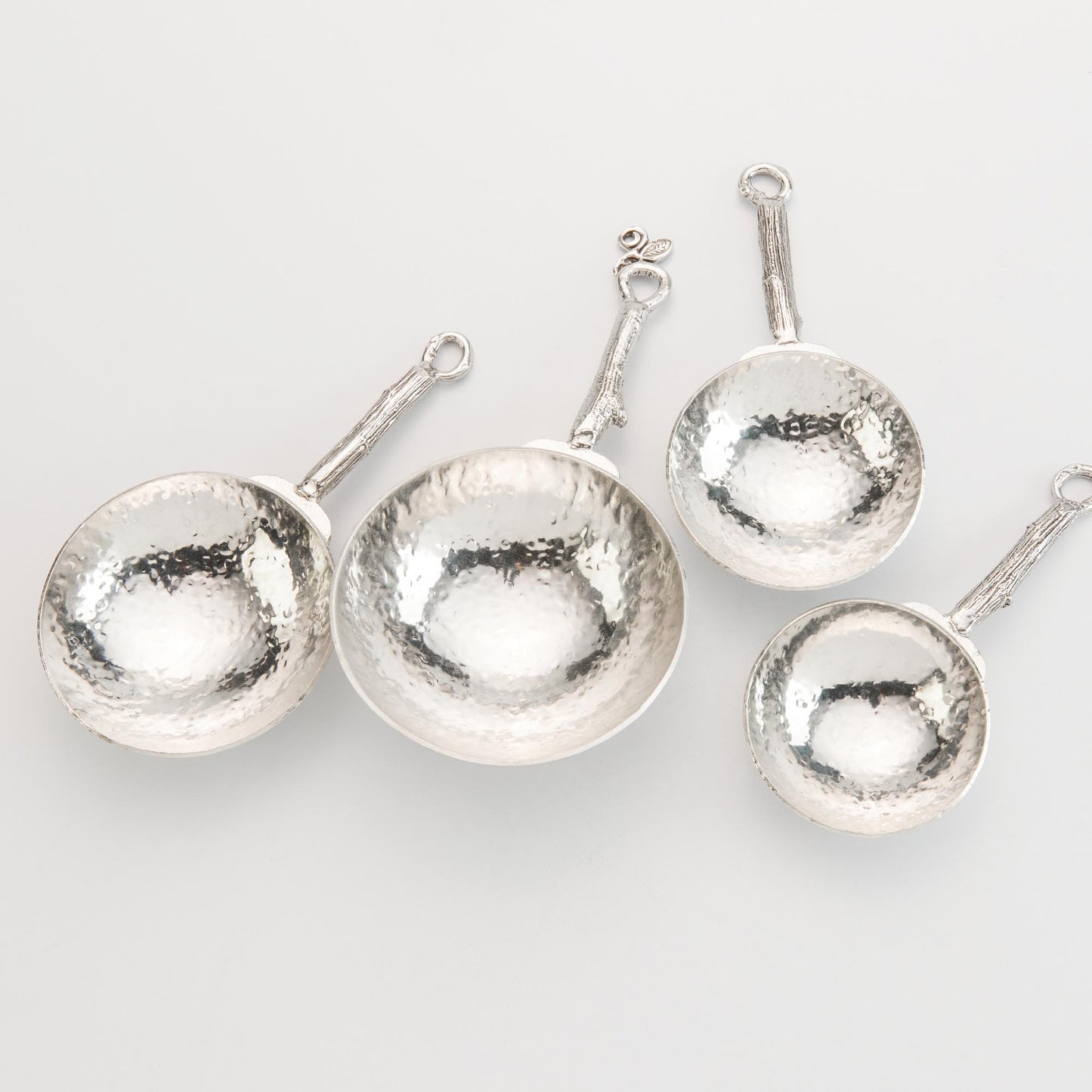 pewter twig measuring cups